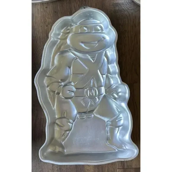 Wilton Cake Pans Lot of 8: Michelangelo,Barney,Smurf, Pooh, Clown, Dinos, Doll - Picture 10 of 11